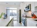 216-460 Gordon Krantz Avenue, Milton, ON  - Indoor Photo Showing Kitchen With Upgraded Kitchen 