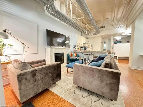 152-78 St Patrick Street, Toronto, ON - Indoor Photo Showing Living Room With Fireplace