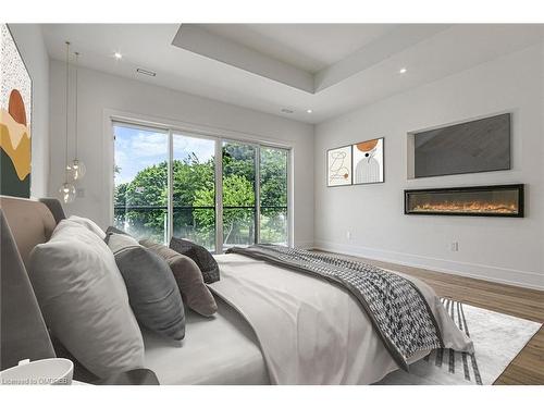 312 North Shore Boulevard W, Burlington, ON - Indoor Photo Showing Bedroom With Fireplace