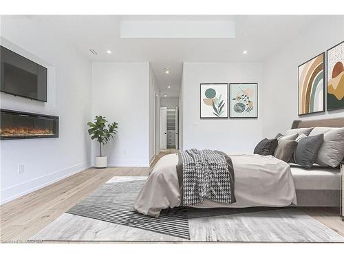 312 North Shore Boulevard W, Burlington, ON - Indoor Photo Showing Bedroom With Fireplace