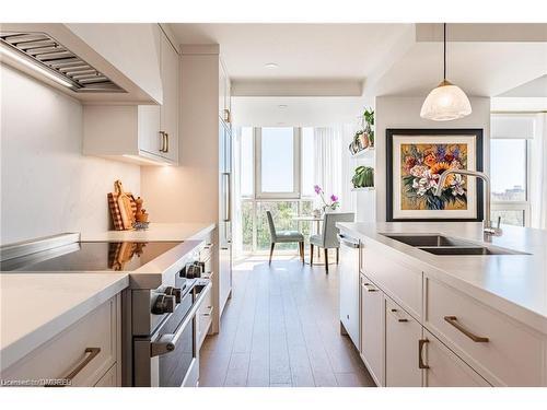 704-50 Old Mill Road, Oakville, ON - Indoor Photo Showing Kitchen With Double Sink With Upgraded Kitchen