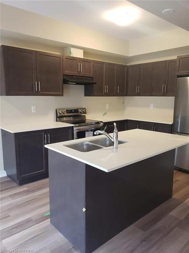 17-324 Equestrian Way, Cambridge, ON - Indoor Photo Showing Kitchen With Stainless Steel Kitchen With Double Sink With Upgraded Kitchen