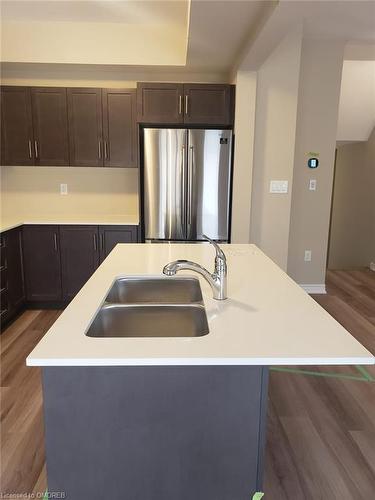 17-324 Equestrian Way, Cambridge, ON - Indoor Photo Showing Kitchen With Double Sink