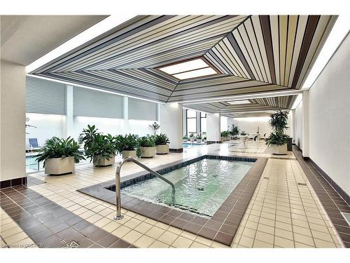 801-2180 Marine Drive, Oakville, ON - Indoor Photo Showing Other Room With In Ground Pool