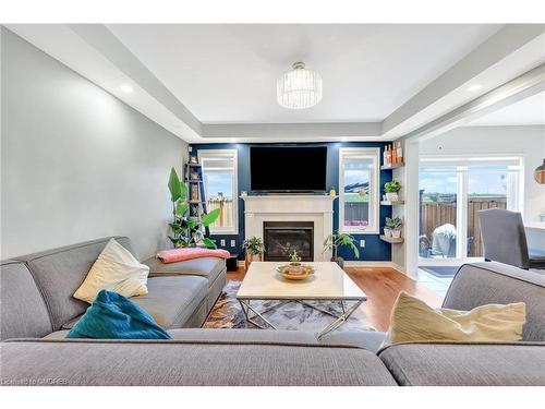 35-1000 Asleton Boulevard, Milton, ON - Indoor Photo Showing Living Room With Fireplace