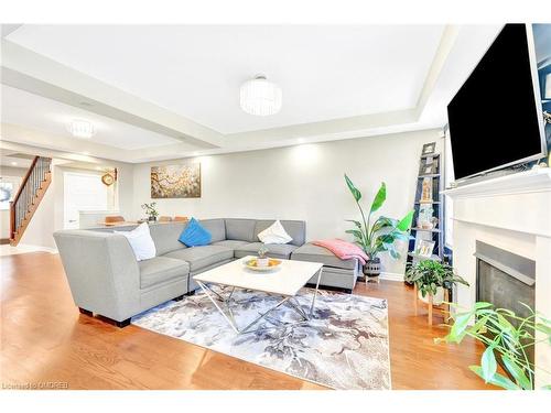 35-1000 Asleton Boulevard, Milton, ON - Indoor Photo Showing Living Room With Fireplace