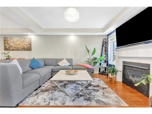 35-1000 Asleton Boulevard, Milton, ON - Indoor Photo Showing Living Room With Fireplace