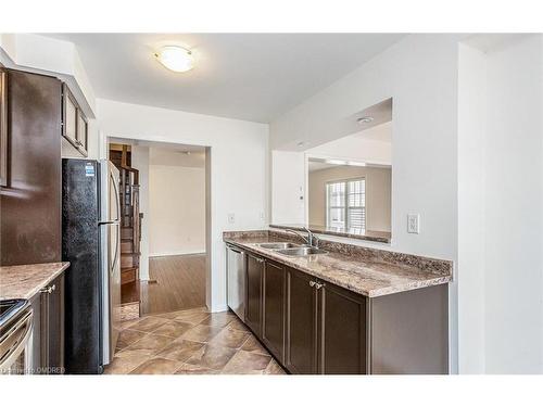 243 Septimus Heights, Milton, ON - Indoor Photo Showing Kitchen With Double Sink