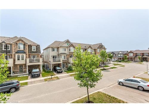 243 Septimus Heights, Milton, ON - Outdoor With Balcony With Facade