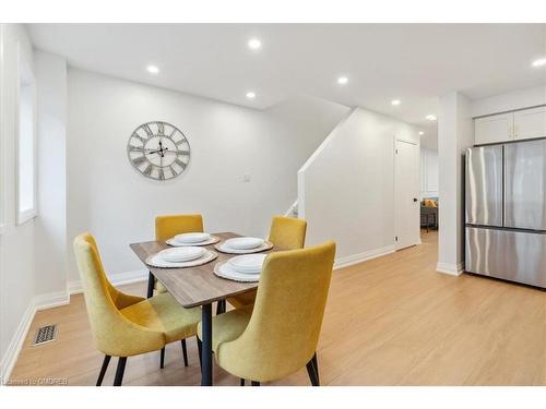 31 Rivers Edge Drive, Toronto, ON - Indoor Photo Showing Dining Room With Fireplace