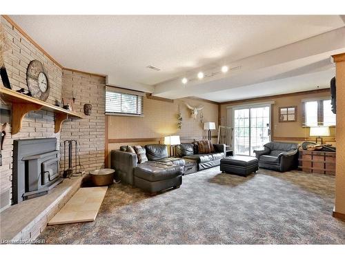 225/269 Campbell Avenue E, Campbellville, ON - Indoor Photo Showing Living Room With Fireplace