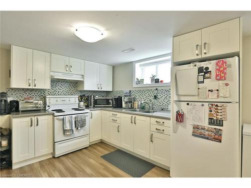 124 Mohawk Road W, Hamilton, ON - Indoor Photo Showing Kitchen With Double Sink