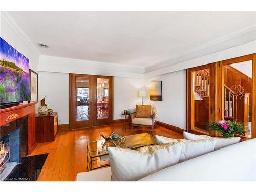 19 Jackson Avenue, Toronto, ON - Indoor Photo Showing Living Room With Fireplace