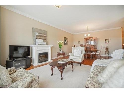 509-1499 Nottinghill Gate, Oakville, ON - Indoor Photo Showing Living Room With Fireplace