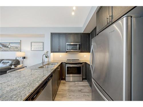 207-1050 Main Street E, Milton, ON - Indoor Photo Showing Kitchen With Stainless Steel Kitchen With Double Sink With Upgraded Kitchen