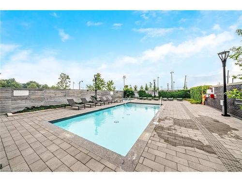 207-1050 Main Street E, Milton, ON - Outdoor With In Ground Pool