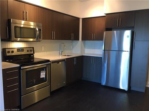 209-65 Speers Road, Oakville, ON - Indoor Photo Showing Kitchen With Stainless Steel Kitchen