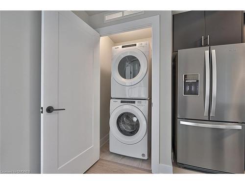 1208-3200 William Coltson Avenue, Oakville, ON - Indoor Photo Showing Laundry Room