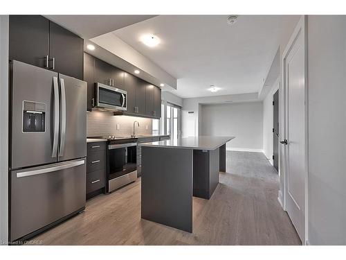 1208-3200 William Coltson Avenue, Oakville, ON - Indoor Photo Showing Kitchen With Upgraded Kitchen