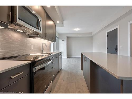 1208-3200 William Coltson Avenue, Oakville, ON - Indoor Photo Showing Kitchen With Upgraded Kitchen