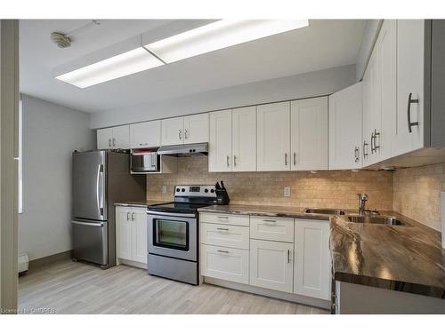 712-5280 Lakeshore Road, Burlington, ON - Indoor Photo Showing Kitchen With Double Sink