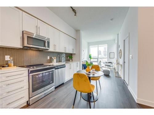 712-4011 Brickstone Mews, Mississauga, ON - Indoor Photo Showing Kitchen With Stainless Steel Kitchen