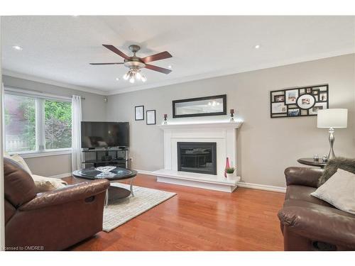 1452 Gibson Drive, Oakville, ON - Indoor Photo Showing Living Room With Fireplace