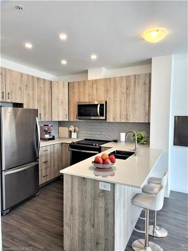 1001-104 Garment Street Street, Kitchener, ON - Indoor Photo Showing Kitchen With Stainless Steel Kitchen With Double Sink