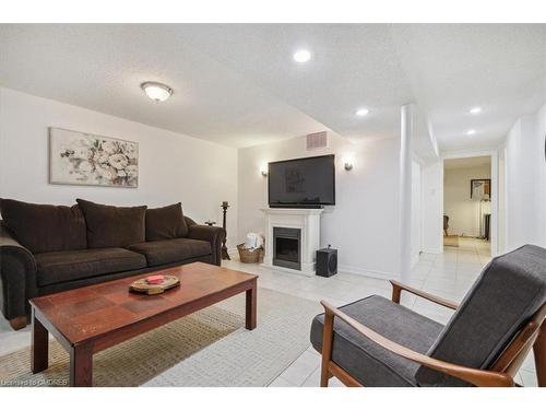 3162 Cantelon Crescent, Mississauga, ON - Indoor Photo Showing Living Room With Fireplace