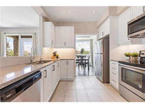 113-2375 Bronte Road, Oakville, ON - Indoor Photo Showing Kitchen With Stainless Steel Kitchen With Upgraded Kitchen