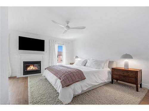 145 Gatwick Drive, Oakville, ON - Indoor Photo Showing Bedroom With Fireplace