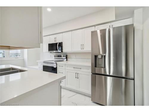 16 Jasmine Square, Brampton, ON - Indoor Photo Showing Kitchen With Stainless Steel Kitchen With Double Sink