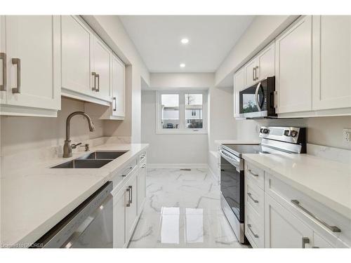 16 Jasmine Square, Brampton, ON - Indoor Photo Showing Kitchen With Double Sink