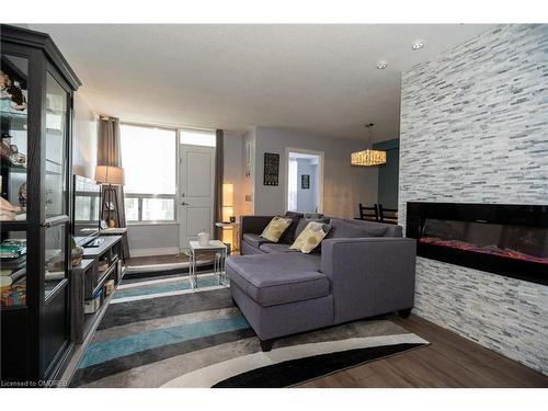 908-20 Edgecliff Golfway, Toronto, ON - Indoor Photo Showing Living Room With Fireplace