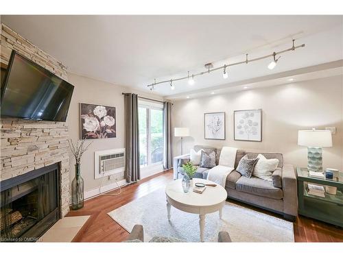 1114-1492 Pilgrims Way, Oakville, ON - Indoor Photo Showing Living Room With Fireplace