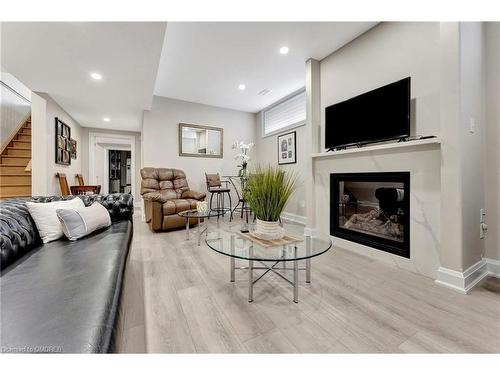 6-6 Beckett Drive, Brantford, ON - Indoor Photo Showing Living Room With Fireplace