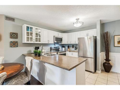 324-2030 Cleaver Avenue, Halton, ON - Indoor Photo Showing Kitchen With Double Sink