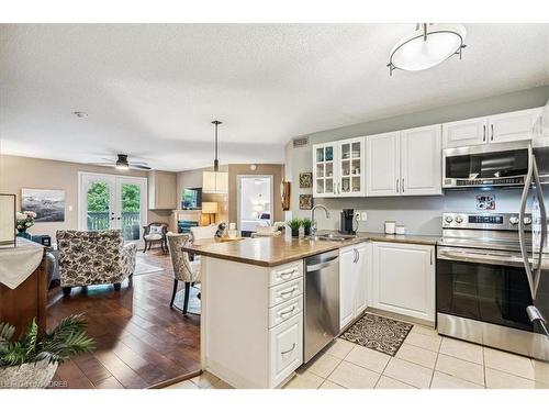 324-2030 Cleaver Avenue, Halton, ON - Indoor Photo Showing Kitchen With Double Sink