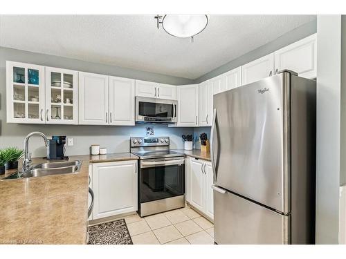 324-2030 Cleaver Avenue, Halton, ON - Indoor Photo Showing Kitchen With Stainless Steel Kitchen With Double Sink