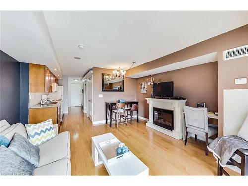 1034-250 Wellington Street W, Toronto, ON - Indoor Photo Showing Living Room With Fireplace