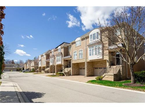 19-1267 Dorval Drive, Oakville, ON - Outdoor With Facade