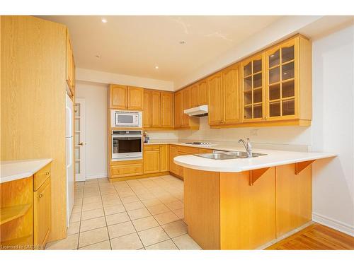 19-1267 Dorval Drive, Oakville, ON - Indoor Photo Showing Kitchen With Double Sink