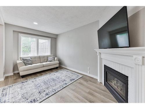 5133 Lampman Avenue, Burlington, ON - Indoor Photo Showing Living Room With Fireplace