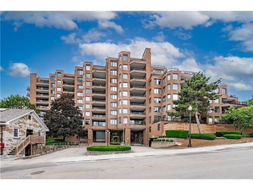 1104-100 Lakeshore Road E, Oakville, ON - Outdoor With Balcony With Facade