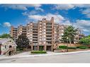 1104-100 Lakeshore Road E, Oakville, ON  - Outdoor With Balcony With Facade 