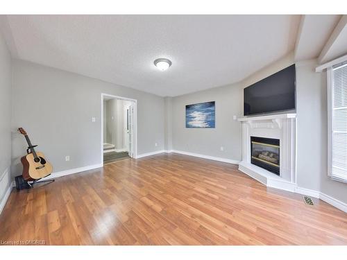 100 Fellowes Crescent, Waterdown, ON - Indoor Photo Showing Other Room With Fireplace