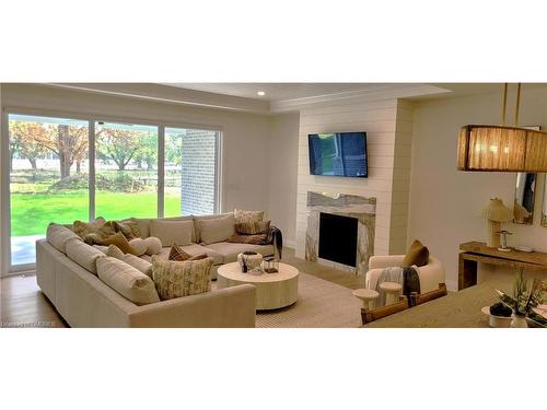 Lot 155-35 Sandcastle Crescent, Amherstburg, ON - Indoor Photo Showing Living Room With Fireplace