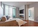 315-205 Sherway Gardens Road W, Toronto, ON  - Indoor Photo Showing Bedroom With Fireplace 