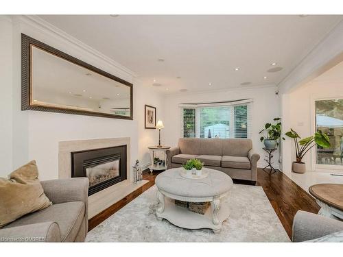 1457 Postmaster Drive, Oakville, ON - Indoor Photo Showing Living Room With Fireplace