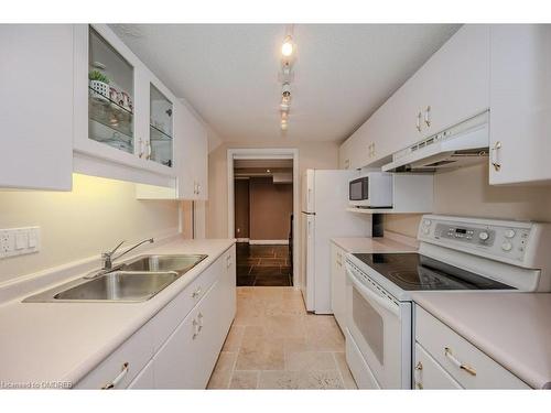 1457 Postmaster Drive, Oakville, ON - Indoor Photo Showing Kitchen With Double Sink